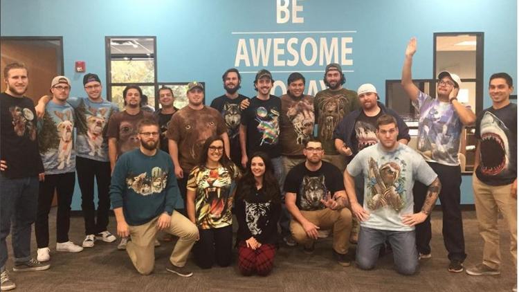 Team members at Arrive Logistics, one of two Austin companies on Inc. magazine's 2017 list of "Best Workplaces." The company hosts a weekly "Wildlife Wednesday" when workers  can dress up as the animal of their choice.